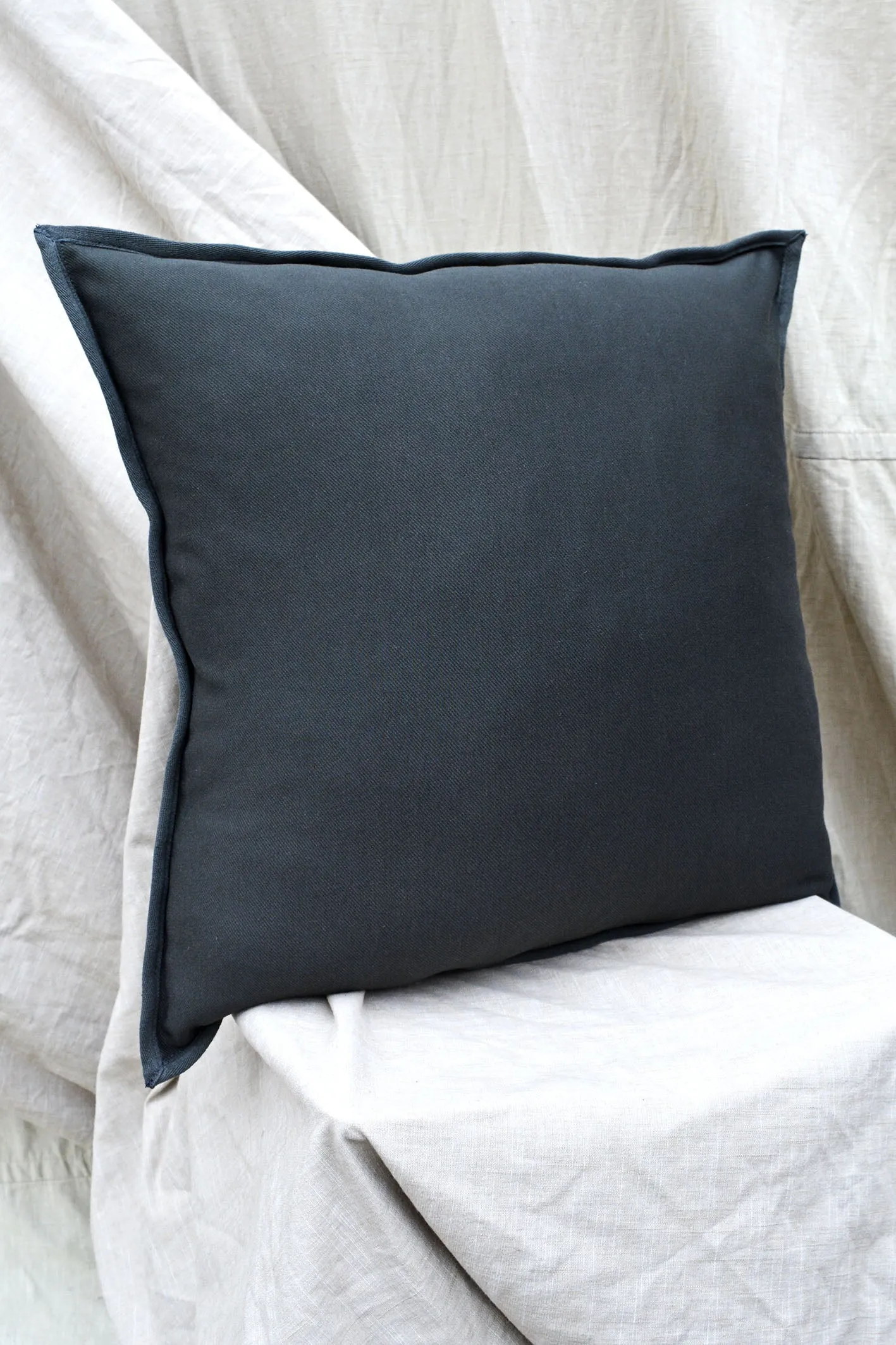 SQUARE APPLIQUE CUSHION - UMBER COCOA